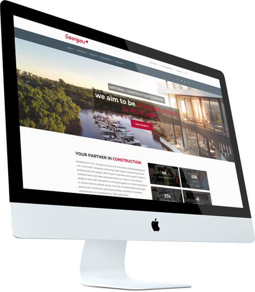 Georgiou Construction website shown on a desktop monitor